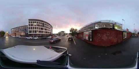 VR360 Rome, A car passes on an iron urban bridge over Tiber River at sunset Video stock 106577366