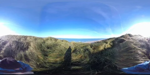 VR360, Walking man, Sand dune on the North Sea coast, Denmark, VR Stock Footage 117534196