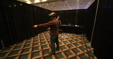 VRLA Expo - Man Using HTC Vive Stock Footage 59582864