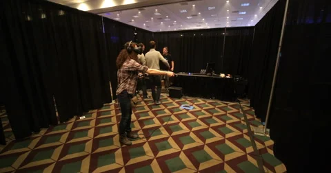 VRLA Expo - Woman Using HTC Vive Stock Footage 59582037