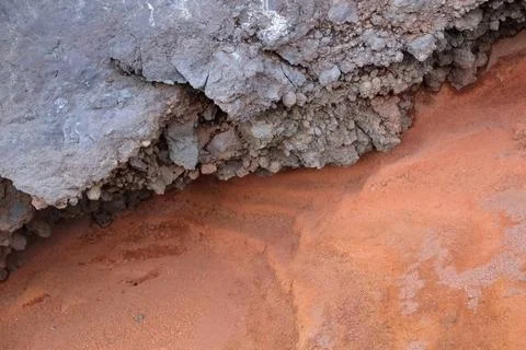 Vulkanische Ablagerungen am Roque de los Muchachos Rostrot schimmernde Sed... Stock Photos