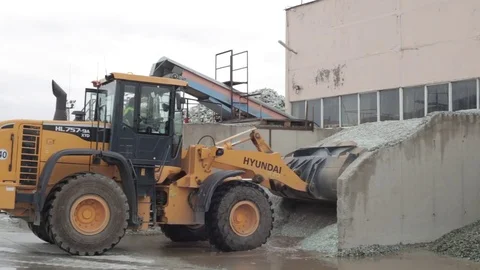 Вulldozer pushes garbage Stock Footage 72857180