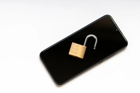 Vulnerable encryption and cyber security shows an open key lock Stock Photos