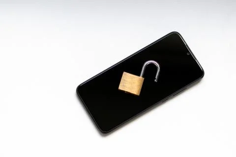 Vulnerable encryption and cyber security shows an open key lock Stock Photos