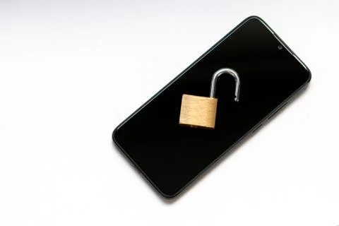 Vulnerable encryption and cyber security shows an open key lock Stock Photos
