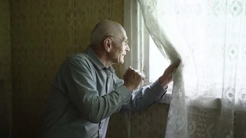 Vulnerable senior man on self isolation is communication with people Stock Footage 150414665