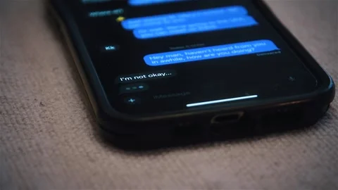 Vulnerable text message conversation with a person that is not okay and hurting. Stock Footage 322145889