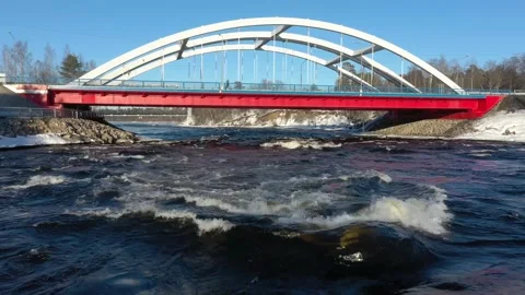 The Vuoksa River and the Losevsky Rapids. Red road bridge. Railway tracks across Stock Footage 196310142