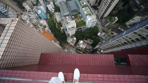 VV1424 Crazy parkour on a skyscraper Stock Footage 129456127