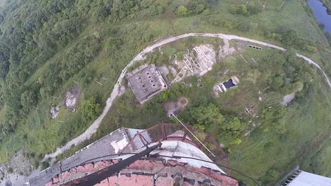 VV2045 Base jumper gets tangled and brushes into wall Stock Footage 129460725