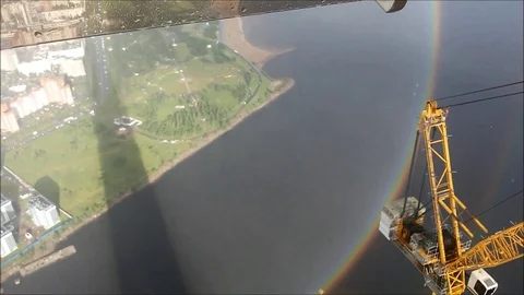 VV2199 Full circle rainbow from Lakhta Center skyscraper in St. Petersburg Stock-Footage 129399247