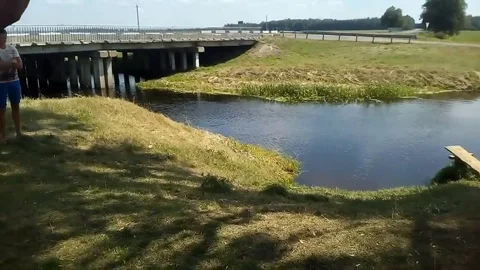 VV3130 Swing fail into lake Stock-Footage 129454945