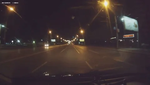 VV3250 Upturned car slides down busy road Stock-Footage 129402286