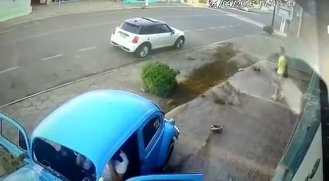 VW Beetle Vs. Mini Cooper, Cruz Machado, Parana, Brazil - 25 Sep 2016 Stock Footage 205314298