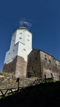 Vyborg Castle, viewed from the bottom up on a sunny day. Stock Photos