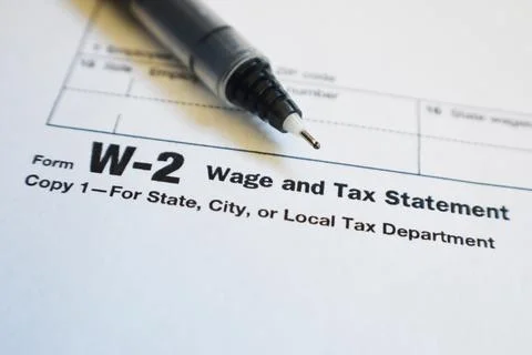 W-2 Tax Form Close Up With Fine Point Pen High Quality Stock Photos