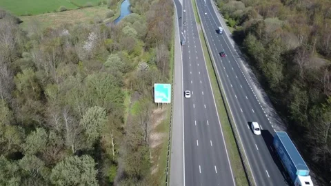 W to E aerial of Junction 8 M65 eastbound slip, Altham, Lancashire UK 10-04-26 Stock Footage 332717409