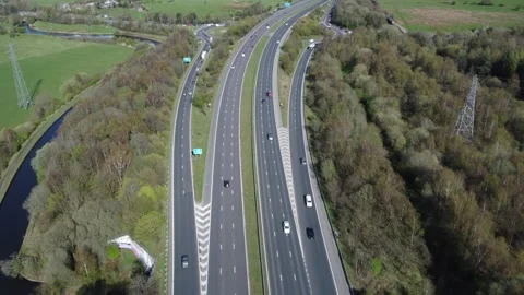 W to E aerial to Junction 8 M65 eastbound slip/roundabout Altham UK 10-04-2026 Stock Footage 332717459