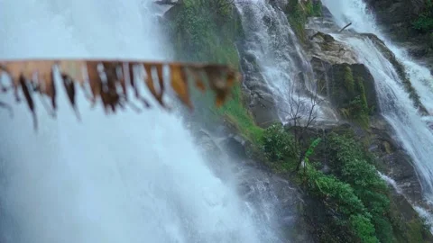 Wachirathan waterfall in the middle of a deep forest on Doi Inthanon, Chiang Mai Stock Footage 143998360