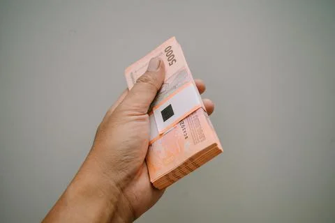 A wad of five thousand rupiah will be ready to be distributed to several ch.. Foto stock