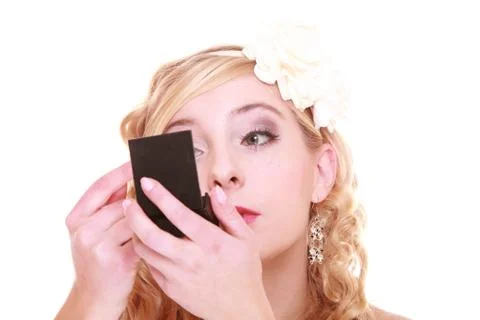 Wadding day. beautiful bride looking in mirror Stock Photos