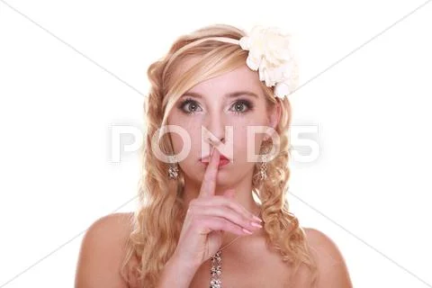 Wadding day. bride showing hand silence sign Stock Photos