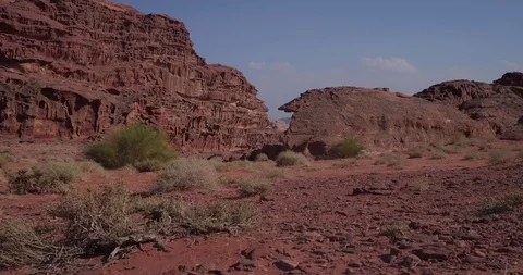 Wadi Rum Drone DJI 4K - Sands and Bushes to mountain 2 Stock Footage 90289528