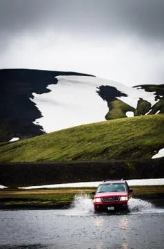 Wading a river Photos