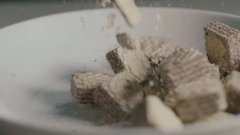 Wafer Biscuits Falls in Slow Motion on a White Plate Stock Footage 89901326