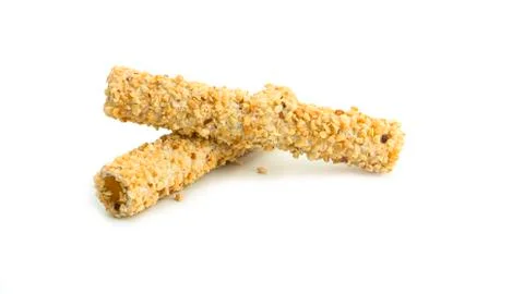 Wafer rolls with nut on a white background. Stock Photos