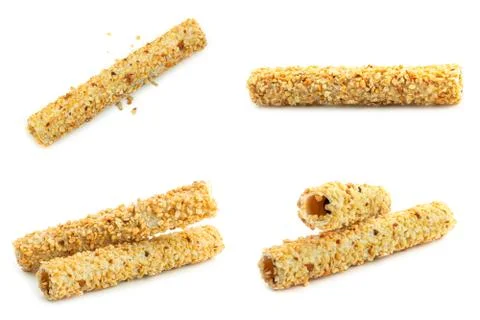 Wafer rolls with nut on a white background. Stock Photos