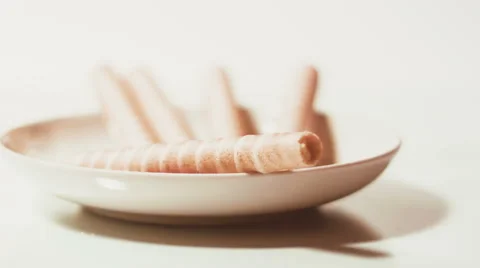 Wafer sticks with cream on a white background Stock Footage 59665269