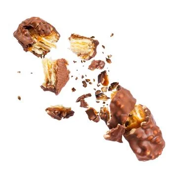Waffle chocolate bar with nuts broken into parts, isolated on white backgroun Stock Photos