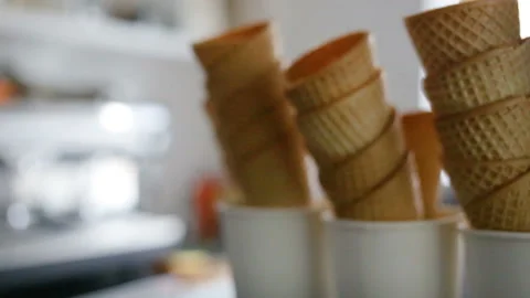 Waffle cones are a stack. The camera approaches the subject, real time, indoors, Stock Footage 93514570