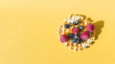 A waffle with different berries Stock Photos
