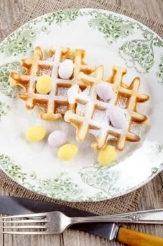 Waffle with easter egg on a plate Stock Photos