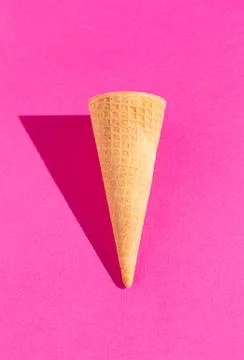 Waffle Ice Cream Cones on a Solid Background with Harsh Lighting Foto stock
