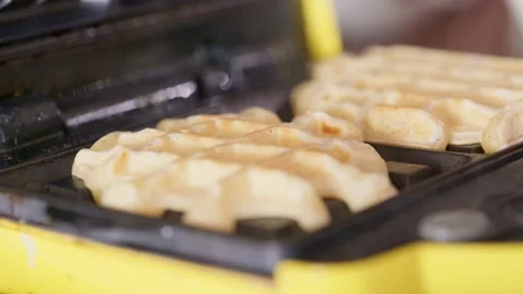 Waffle maker with fresh made belgian waffles Stock Footage 130490515