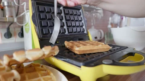Waffle maker with fresh made belgian waffles Stock Footage 130490524