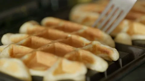 Waffle maker with fresh made belgian waffles Stock Footage 130490527
