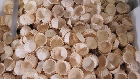 Waffle products fall on tartlets heap for following stage Video stock 125008936