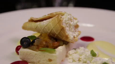 Waffle rolled up with curd and fresh berries. Stock Footage 131056483