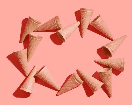 Waffle sweet cones pattern on a color background of the year 2019 Living Co.. Stock Photos