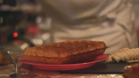 Waffle while icing sugar is sprinkled over it Stock Footage 30463673