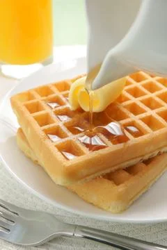 Waffles and maple syrup Foto stock