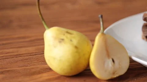 Waffles breakfast with pear on the table Stock Footage 67674783