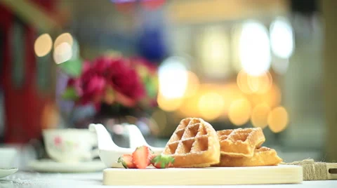 Waffles breakfast with strawberry on the table. Stock Footage 51413519
