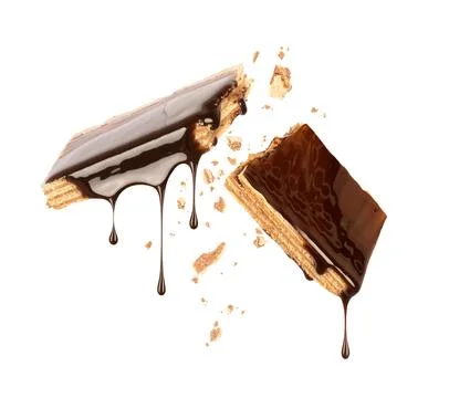 Waffles broken into two halves and poured with chocolate Stock Photos