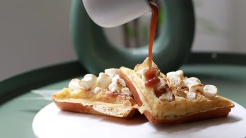Waffles caramel sauce. Plate of belgian waffles Stock Footage 148934331