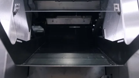 Waffles fall out compartment passing production final stage Stock Footage 125008931